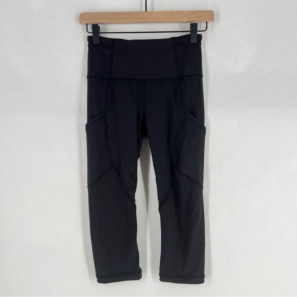 Lululemon Black Cropped Capri Leggings with Pockets Sheer Mesh Leg Panels Size 4